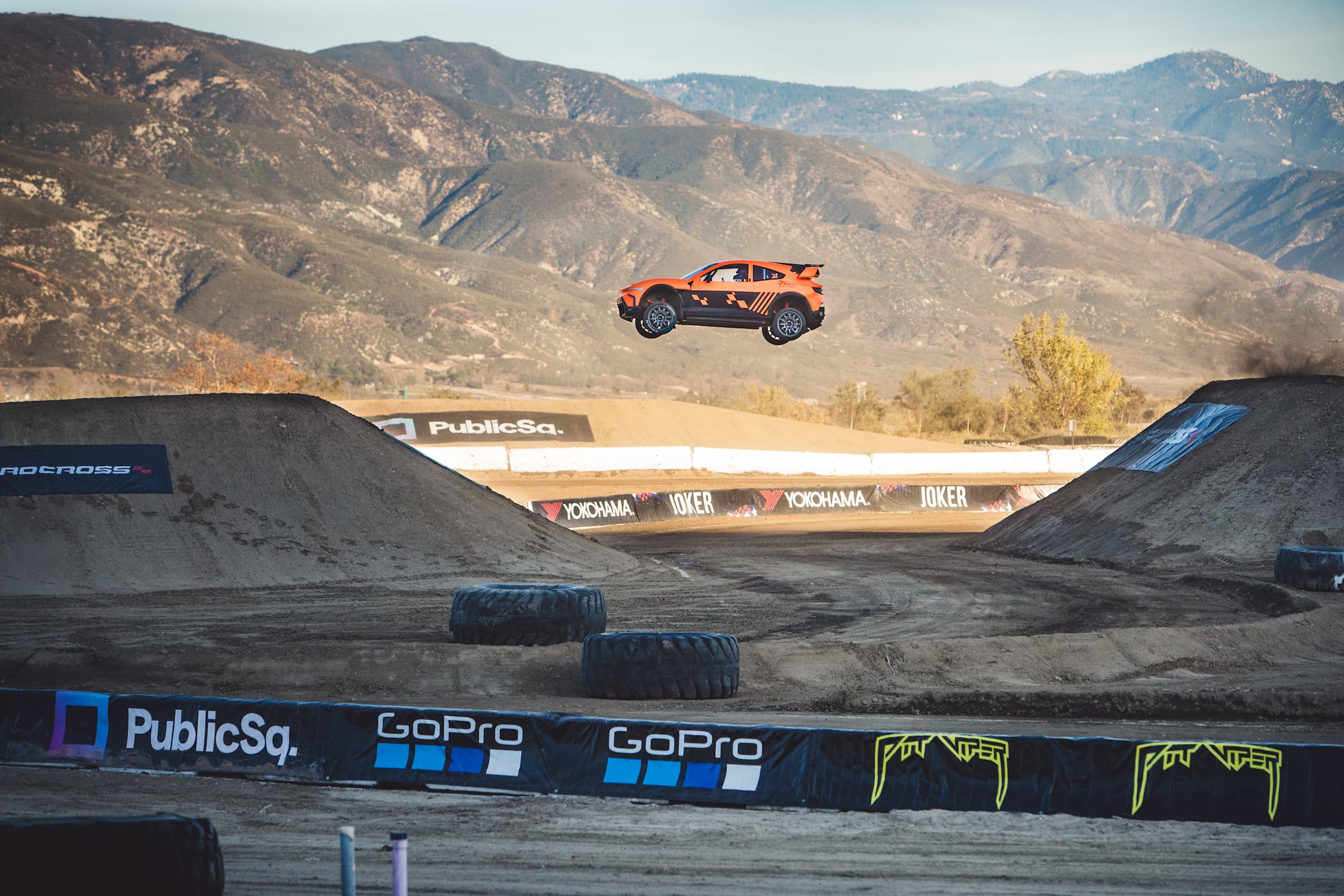Top fuel dragster launch — fire, smoke, 10,000 horsepower